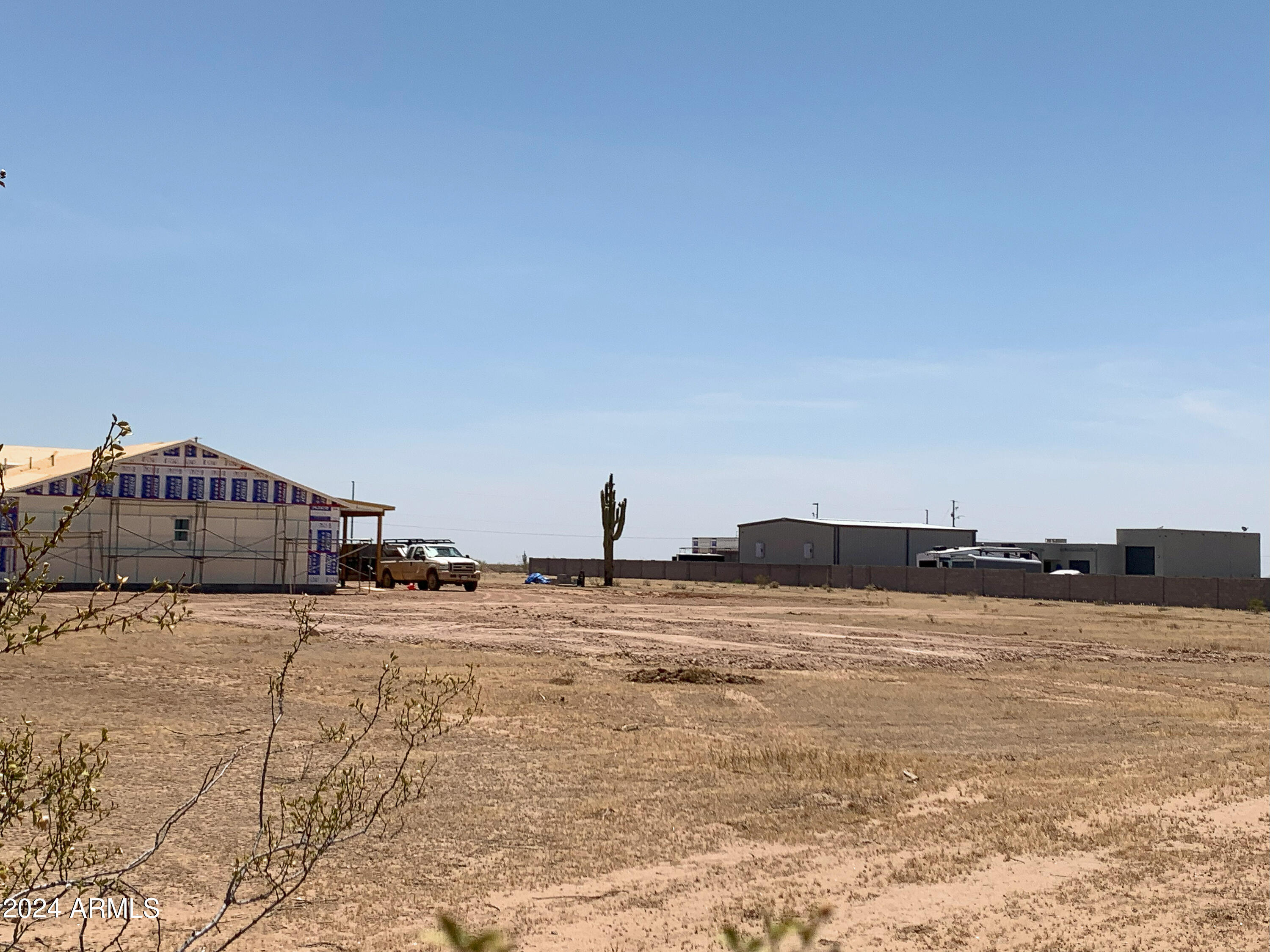 0 West Lowden Road Wittmann, AZ 85361 - Photo 3 of 20 a view of a lake with houses