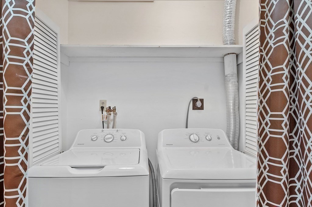 11 Labrecque Street, Unit 3 Manchester, NH 03102 - Photo 22 of 27 a bathroom with a sink and a mirror