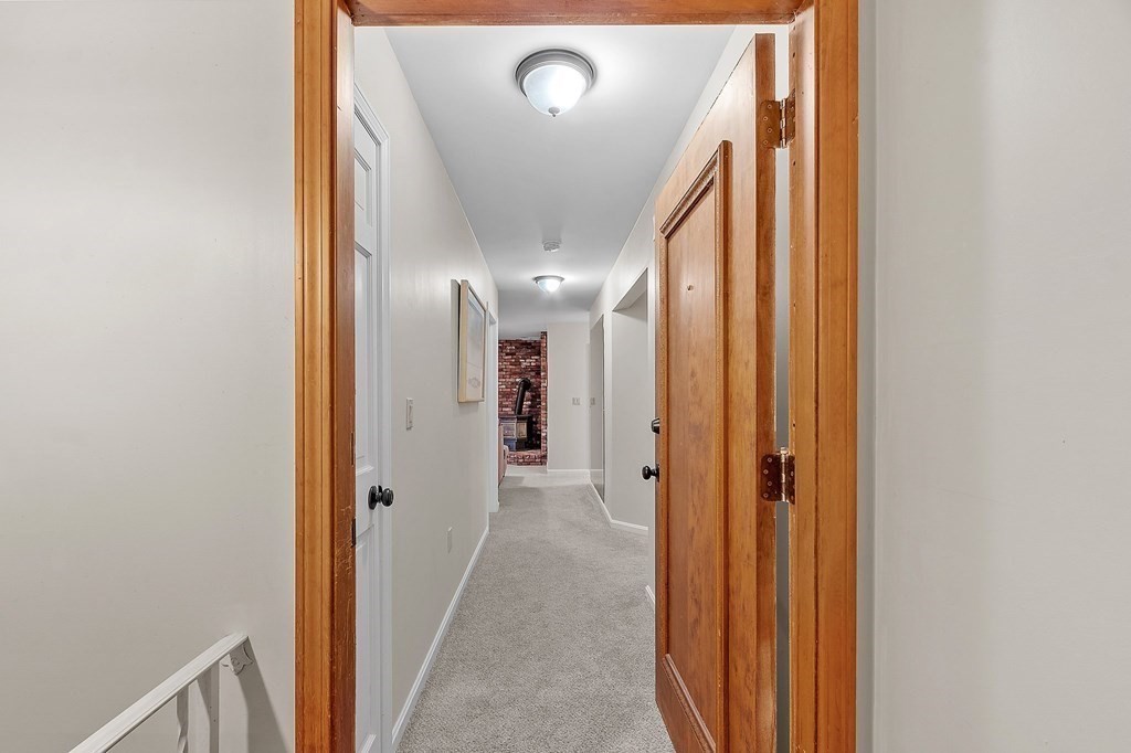 11 Labrecque Street, Unit 3 Manchester, NH 03102 - Photo 6 of 27 a view of hallway with a mirror