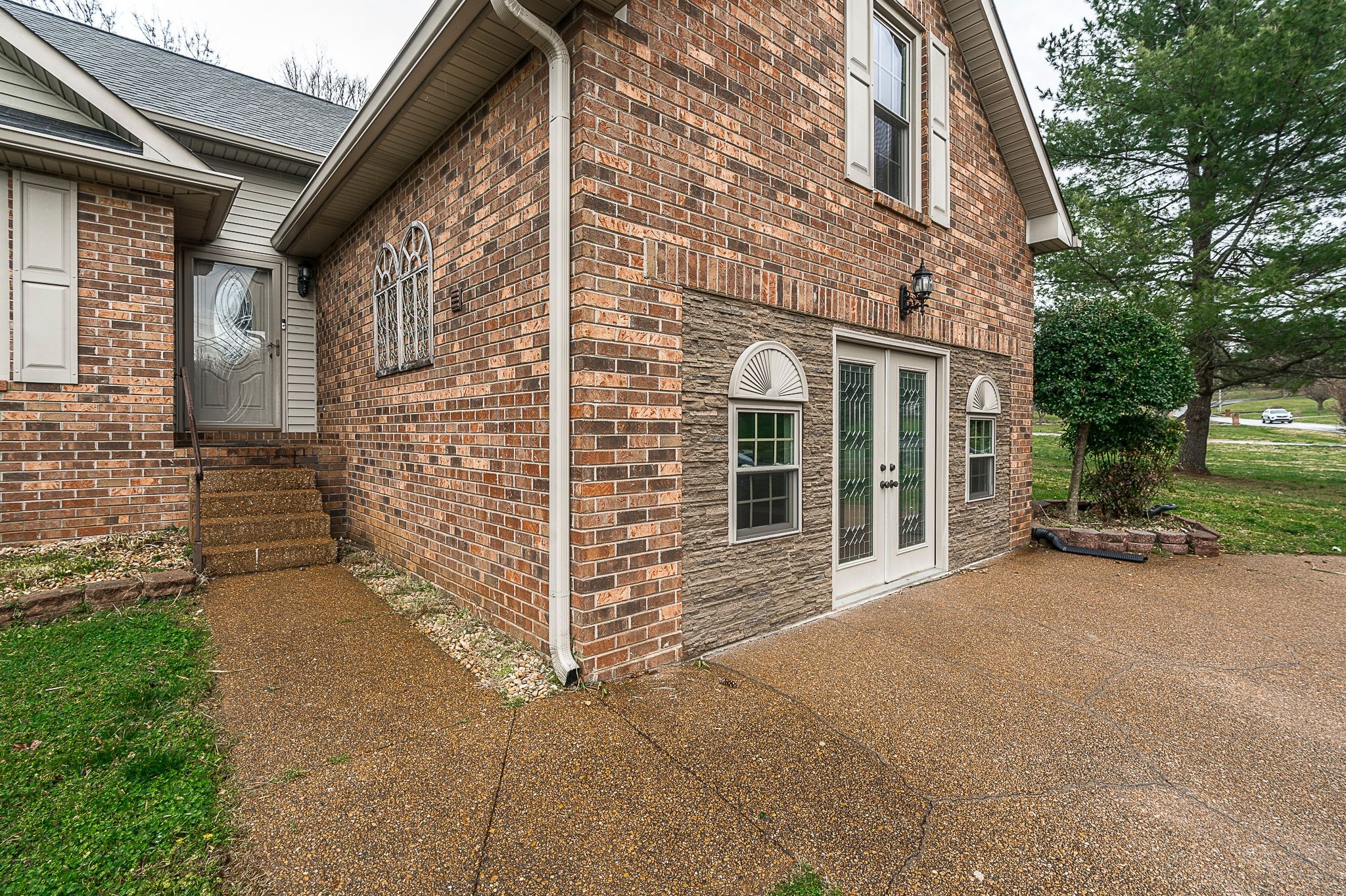 6280 Gum Station Road Springfield, TN 37172 - Photo 4 of 49 a view of a brick buildings with many windows