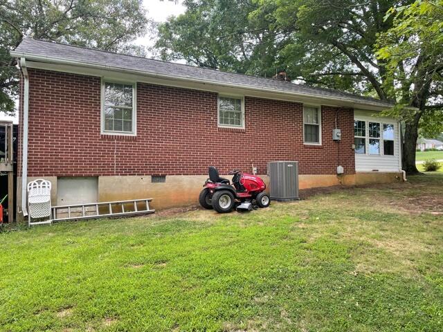 119 Robertson Ridge Road Axton, VA 24054 - Photo 17 of 25 a view of a house with a yard and sitting area