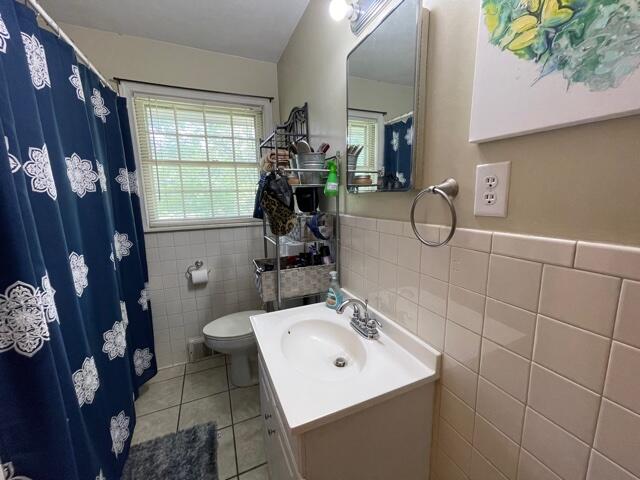 119 Robertson Ridge Road Axton, VA 24054 - Photo 5 of 25 a bathroom with a sink mirror and window