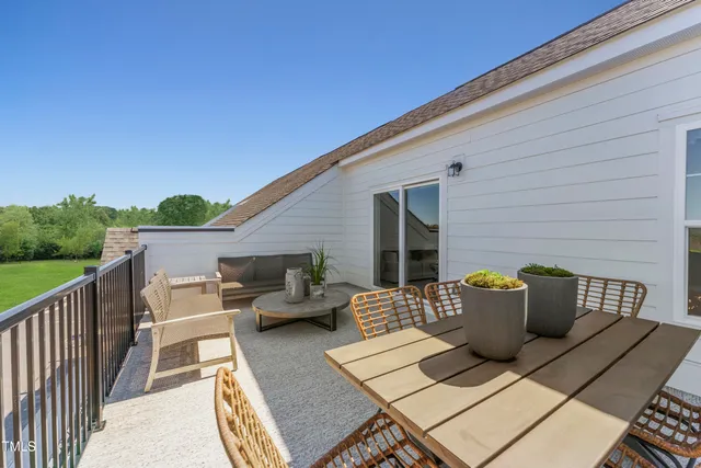 a view of a patio on the roof deck