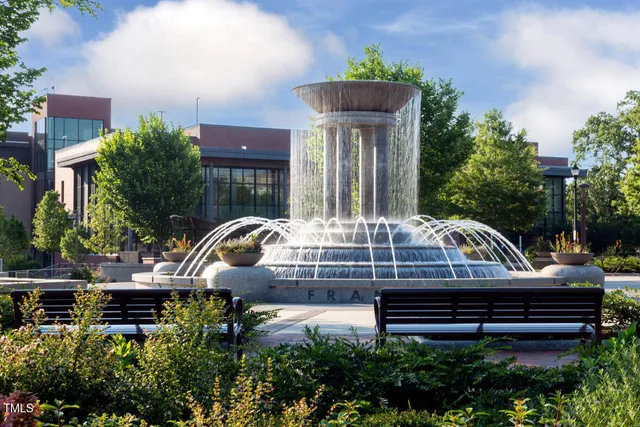 a park view with a bench in the patio
