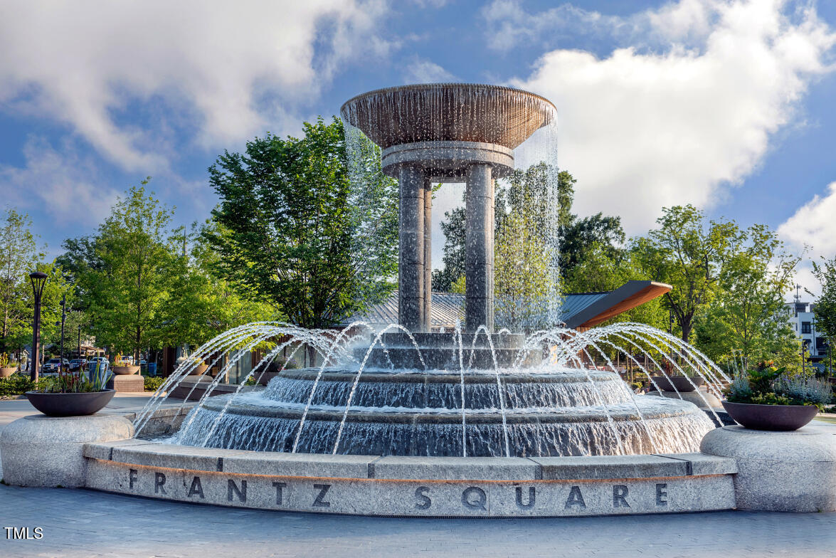 2722 Kempthorne Road Cary, NC 27519 - Photo 29 of 40 a front view of a house with garden