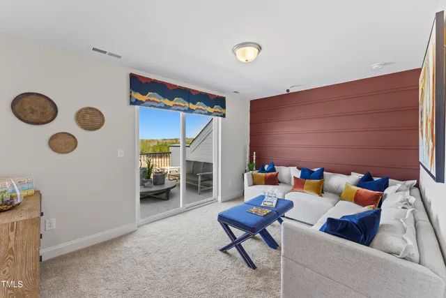 a outdoor living space with furniture and a fireplace