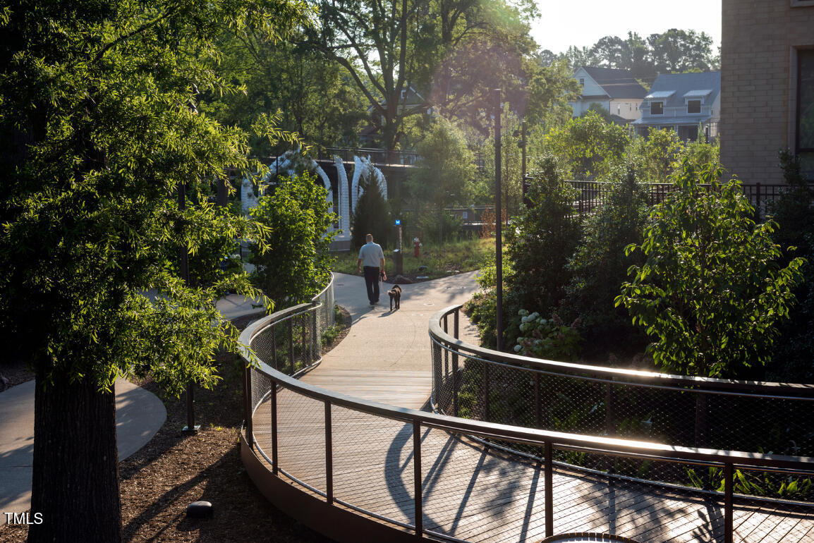 2722 Kempthorne Road Cary, NC 27519 - Photo 32 of 40 a view of a balcony with wooden floor and fence