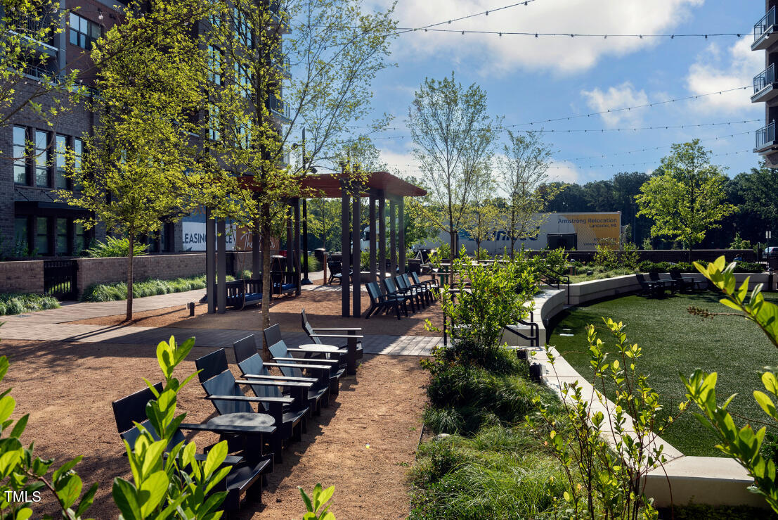 2722 Kempthorne Road Cary, NC 27519 - Photo 38 of 40 a swimming pool view with a seating space