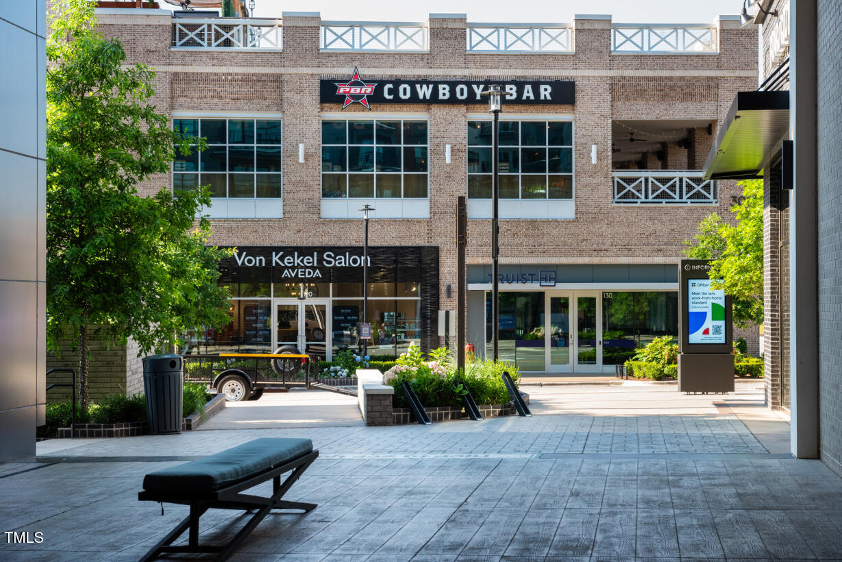 2722 Kempthorne Road Cary, NC 27519 - Photo 40 of 40 a view of a building with a porch