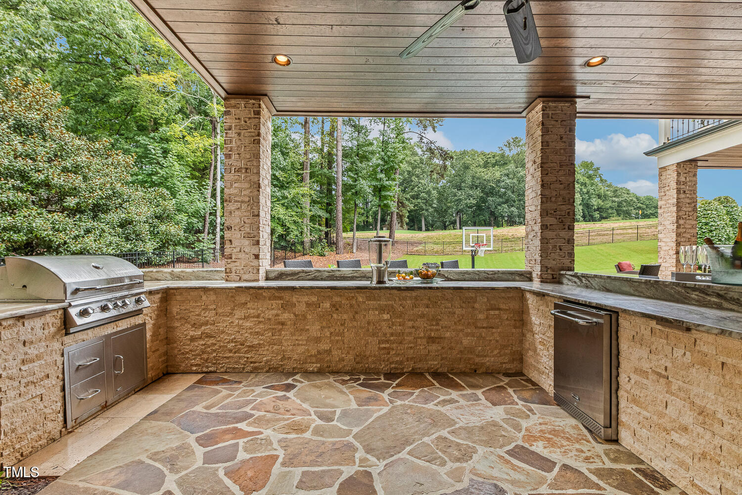 1205 Queensferry Road Cary, NC 27511 - Photo 55 of 63 a view of a kitchen with a sink and cabinets