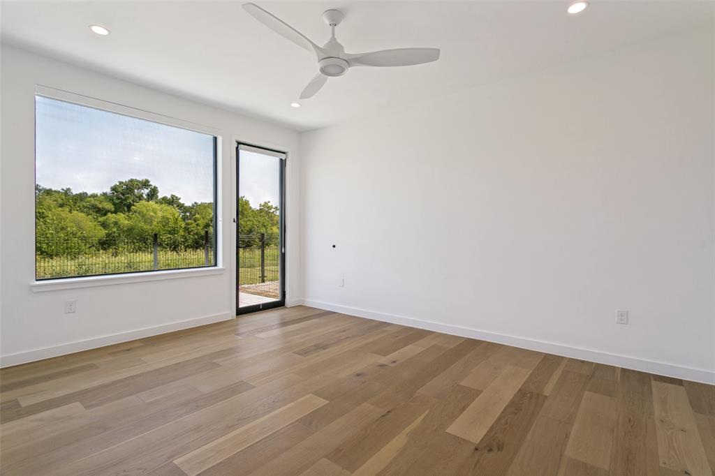 1111 Raiford Road, Unit 100 Carrollton, TX 75007 - Photo 5 of 33 Bedroom located on 1st floor. (2 of 4 total bedrooms)