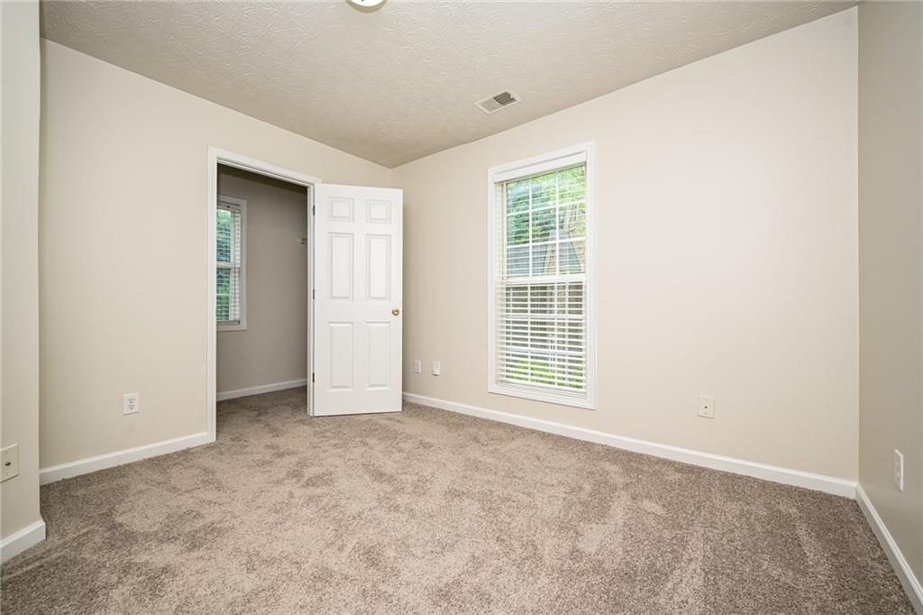 4468 Abram Way Conley, GA 30288 - Photo 12 of 23 an empty room with windows