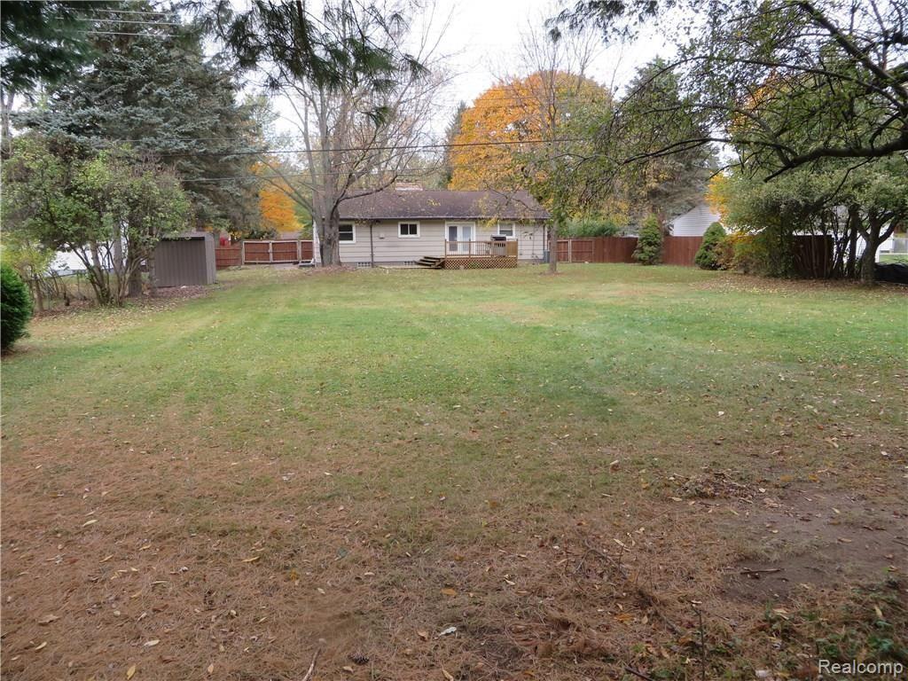 110 Texas Avenue Rochester, MI 48309 - Photo 10 of 20 Beautiful half acre lawn / treed partially fenced backyard in a quiet location!