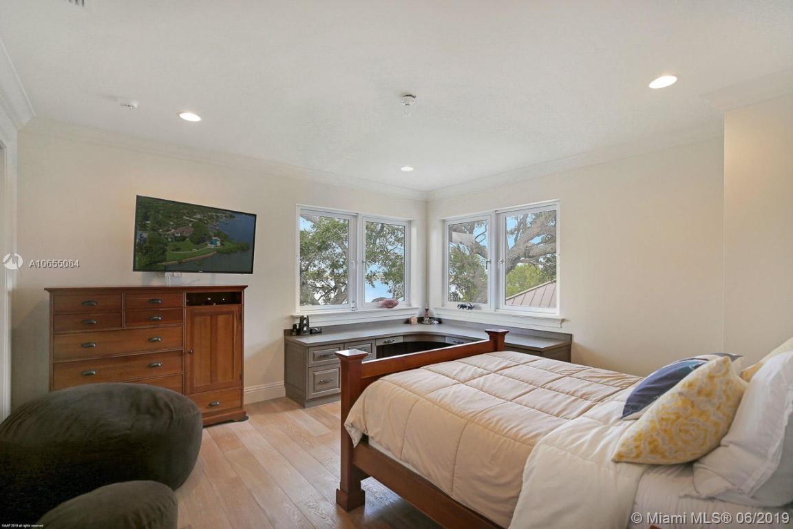 5241 Pennock Point Road Jupiter, FL 33458 - Photo 34 of 51 a bedroom with a bed and a window