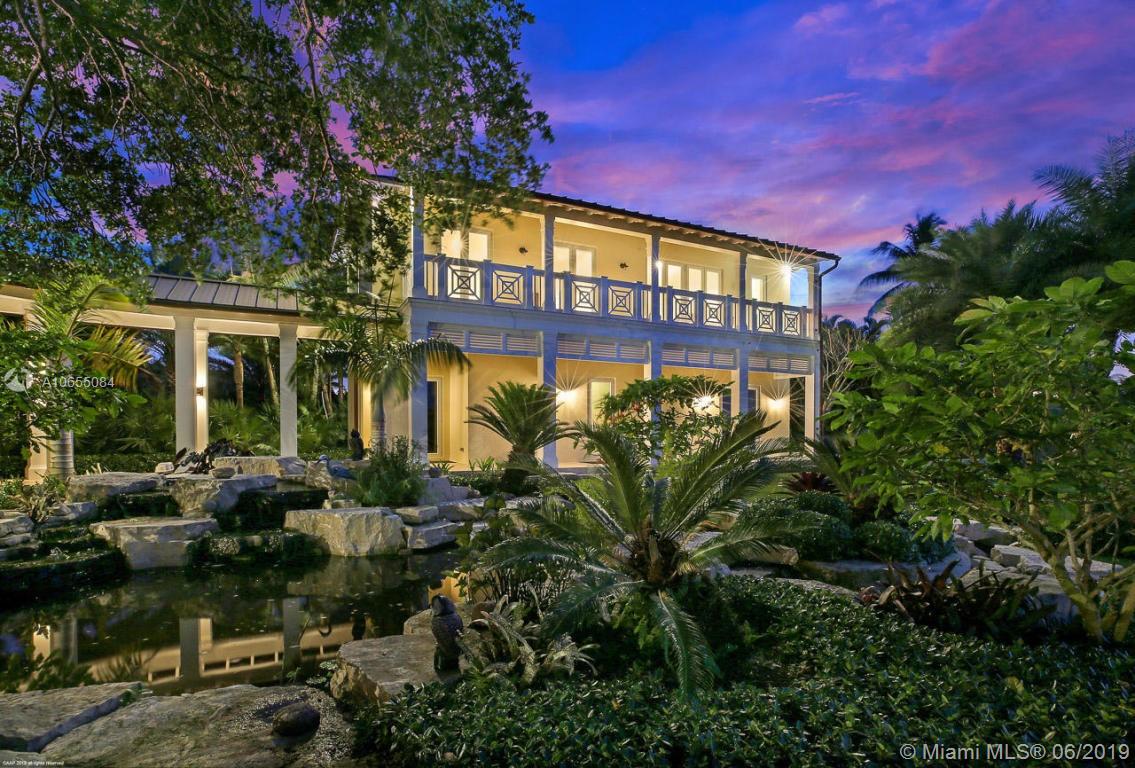 5241 Pennock Point Road Jupiter, FL 33458 - Photo 39 of 51 a front view of a building