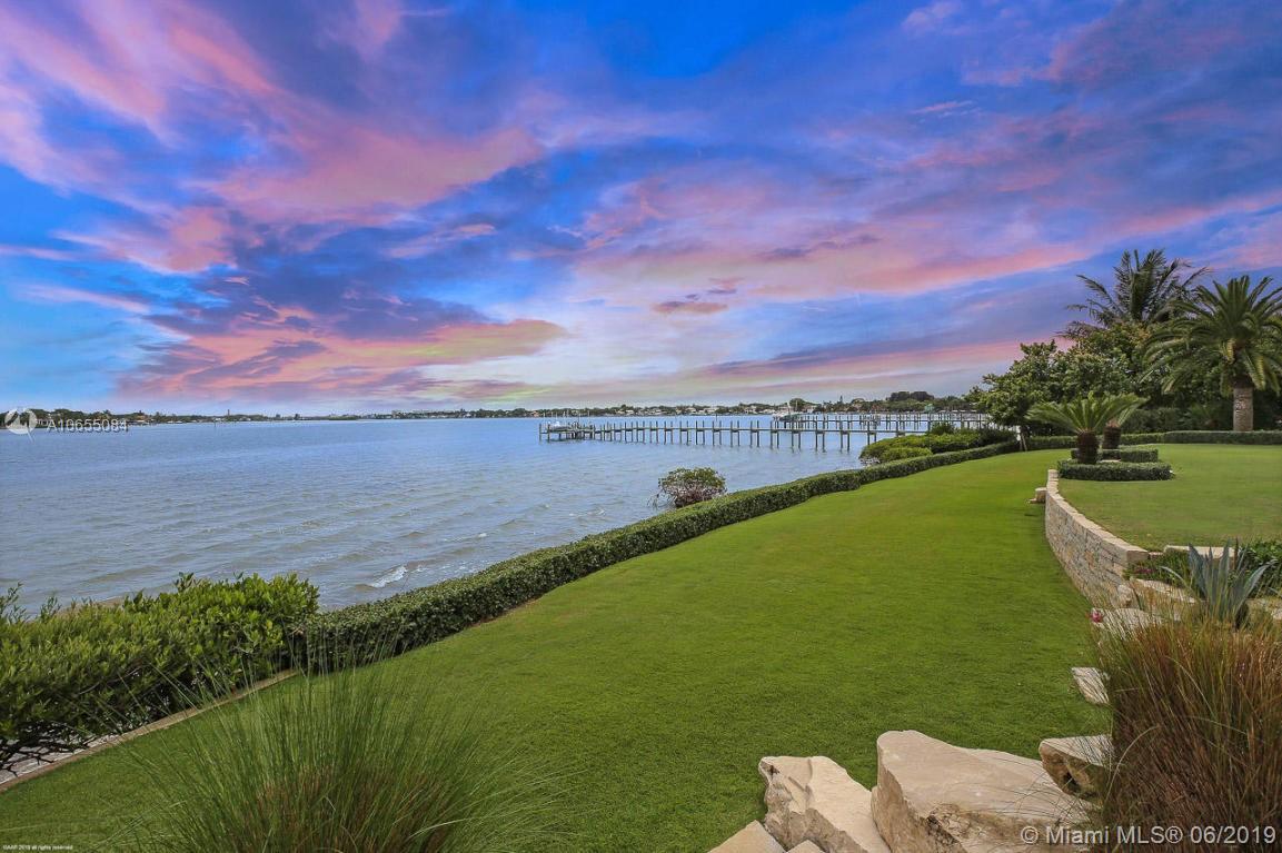5241 Pennock Point Road Jupiter, FL 33458 - Photo 4 of 51 a view of a lake with a big yard