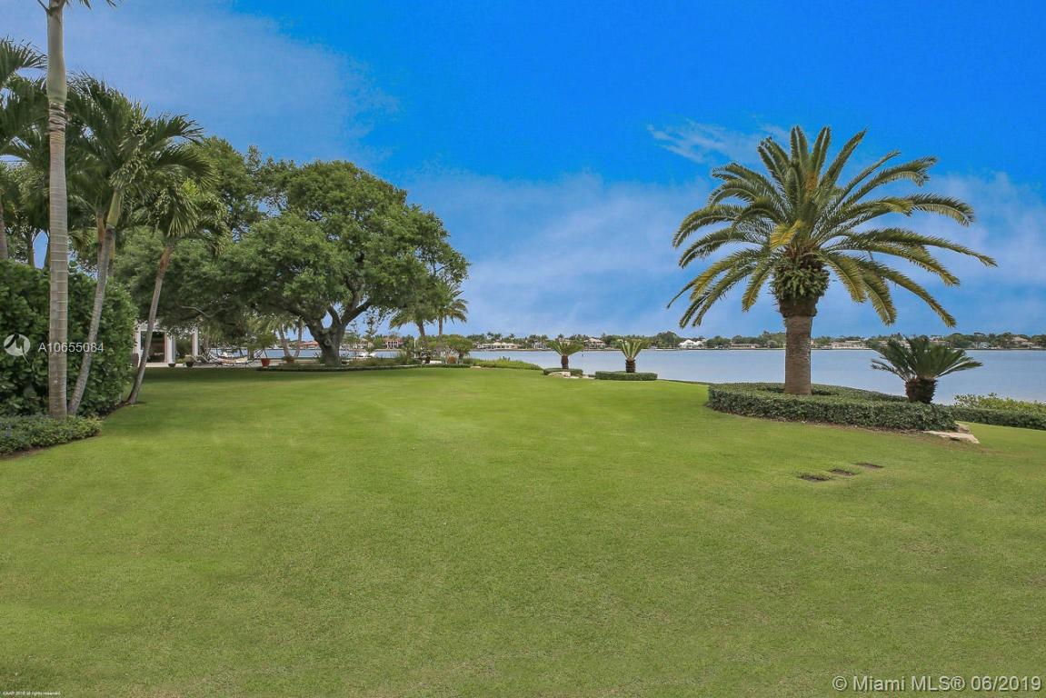 5241 Pennock Point Road Jupiter, FL 33458 - Photo 45 of 51 a view of three trees and yard