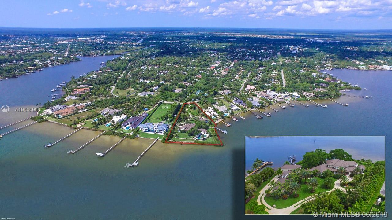5241 Pennock Point Road Jupiter, FL 33458 - Photo 47 of 51 an aerial view of lake and residential houses with outdoor space