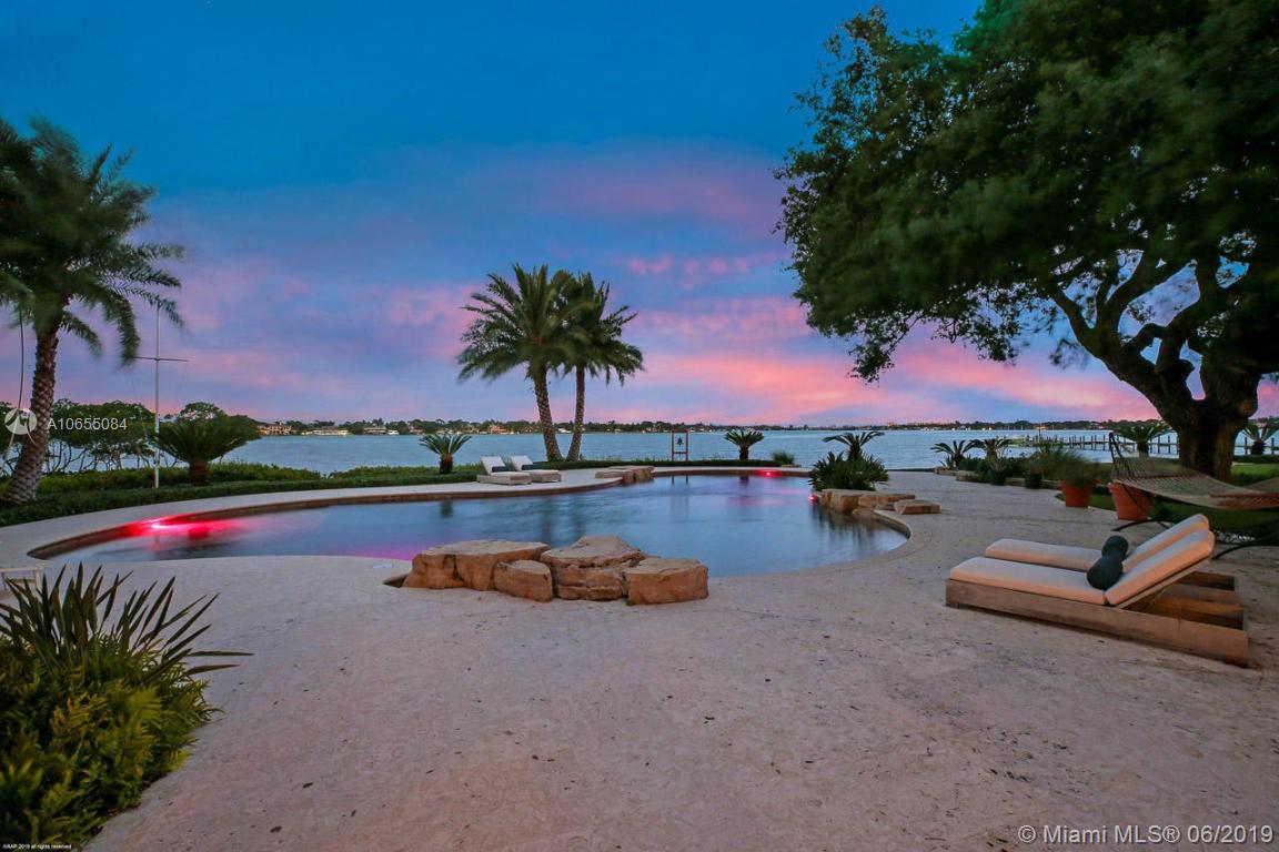 5241 Pennock Point Road Jupiter, FL 33458 - Photo 6 of 51 an outdoor space with pool and lake view