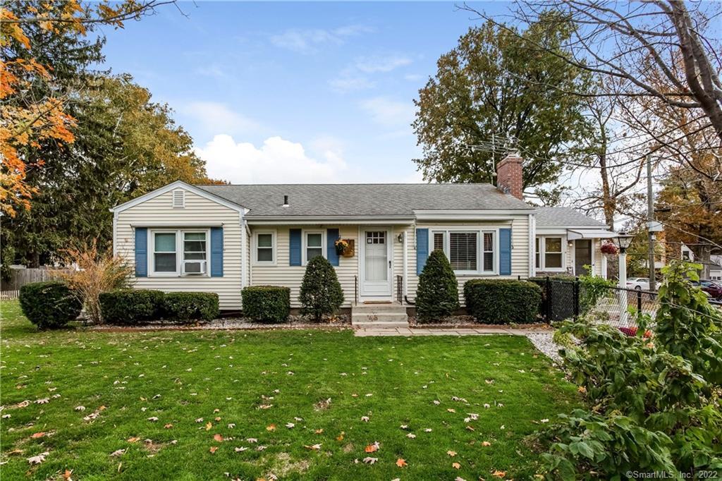 98 Ballfall Road Middletown, CT 06457 - Photo 1 of 1 a front view of house with yard outdoor seating and green space