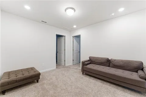 a living room with furniture and a couch