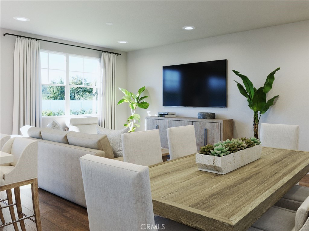 28234 Heirloom Drive Temecula, CA 92591 - Photo 8 of 17 a living room with furniture flat screen tv and a large window