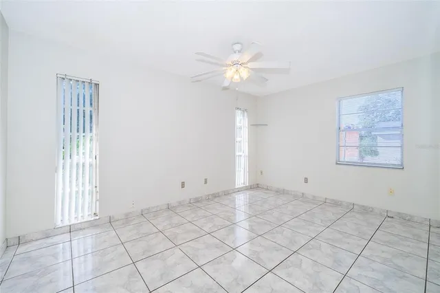 a view of an empty room and window