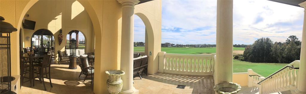 7662 Whisper Way, Unit 103 Reunion, FL 34747 - Photo 27 of 39 a view of a balcony with floor to ceiling windows