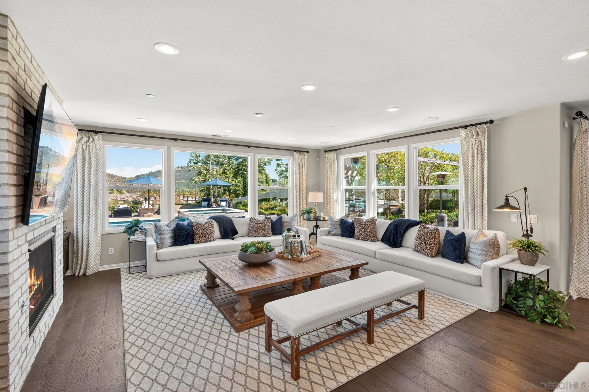 21509 Wilgen Road Escondido, CA 92029 - Photo 13 of 37 a living room with furniture large windows and wooden floor