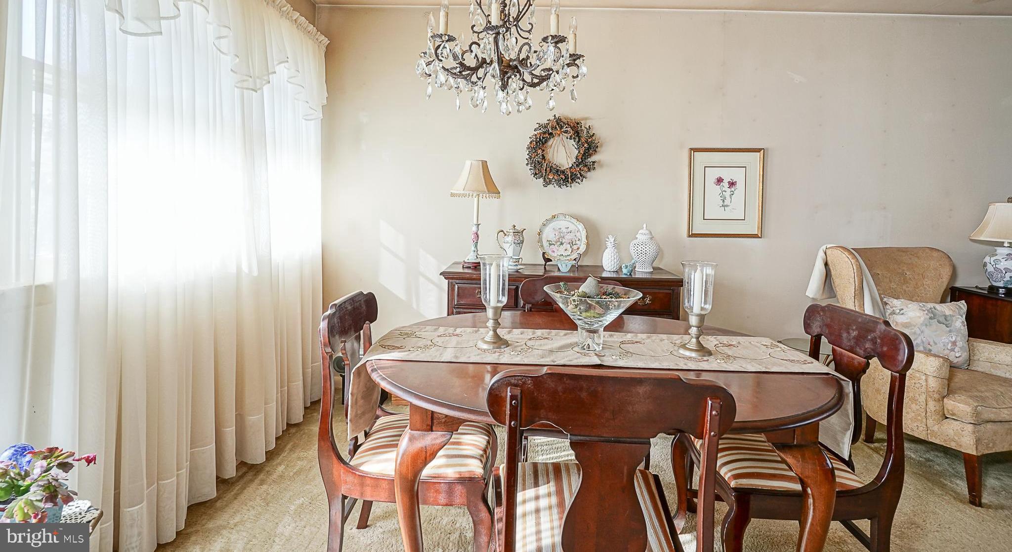 410 Cornwall Road Cherry Hill, NJ 08034 - Photo 8 of 27 a view of a dining room with furniture and wooden floor