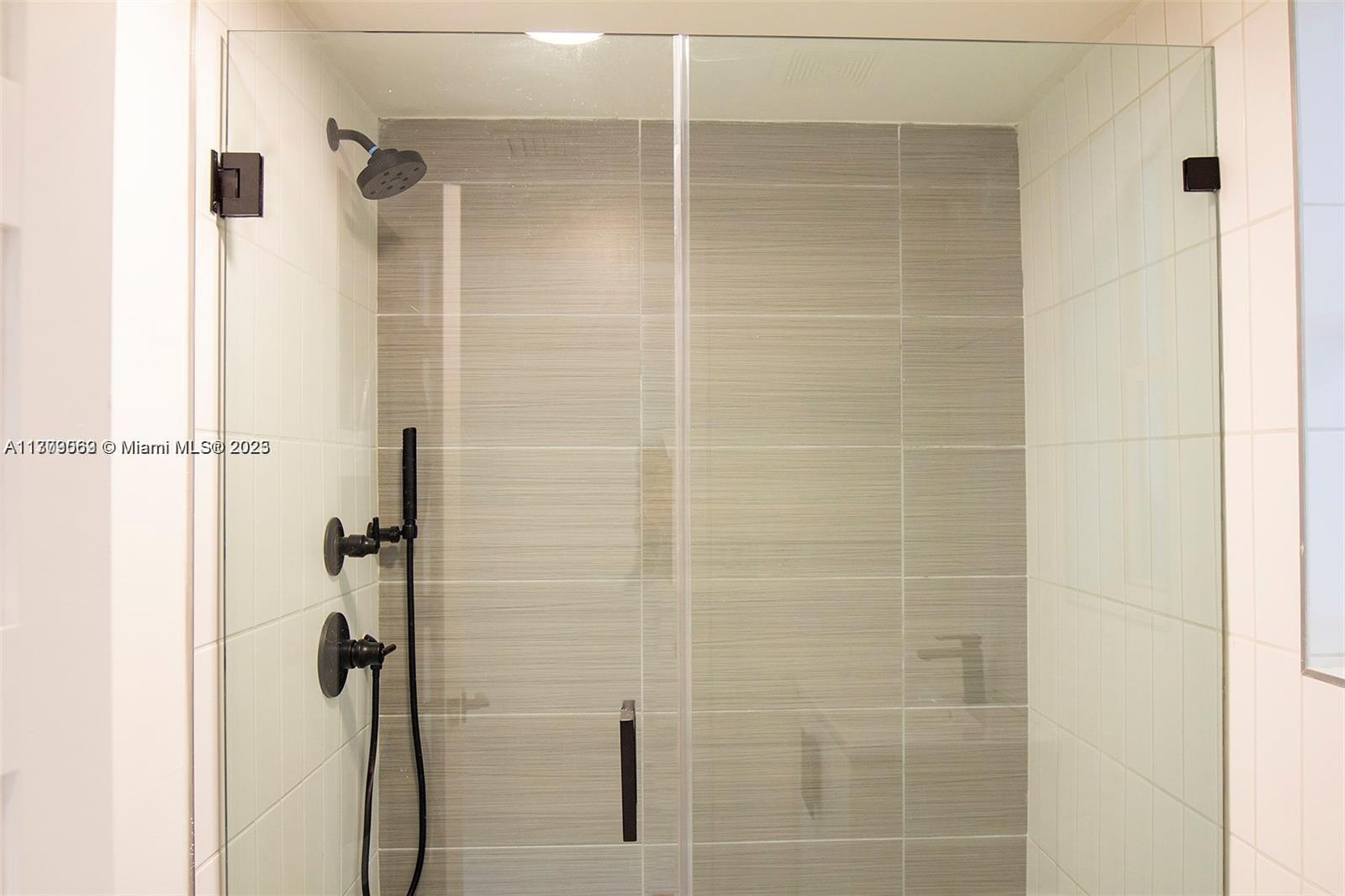 1000 7th Street Miami Beach, FL 33139 - Photo 22 of 41 a bathroom with a shower
