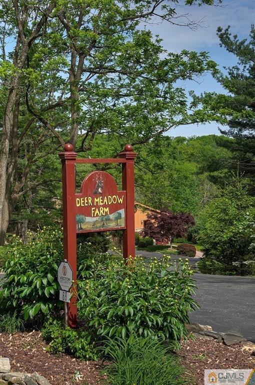 68 Harbourton Woodsville Road Pennington, NJ 08534 - Photo 2 of 25 a sign that is sitting in the middle of a park