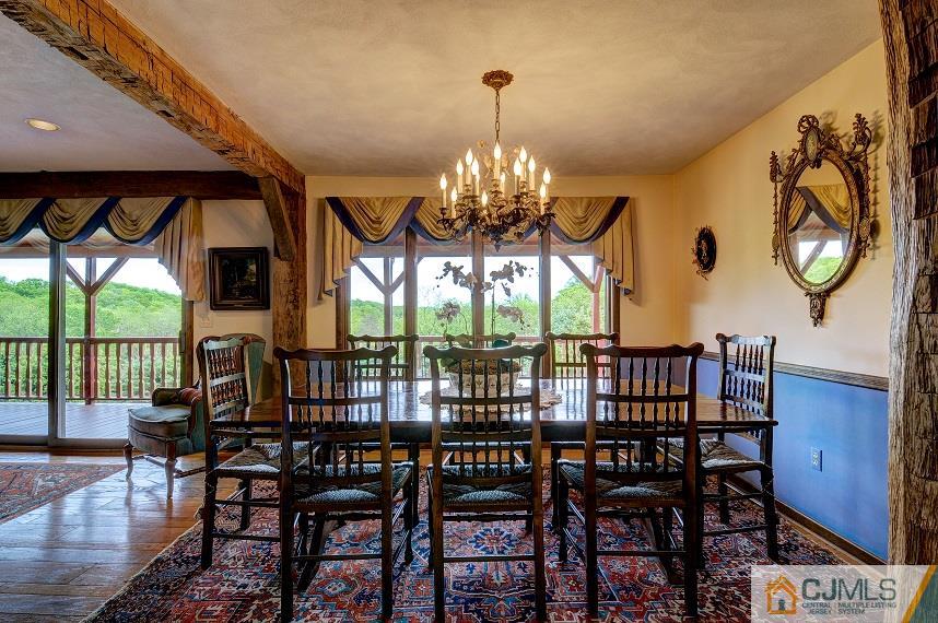 68 Harbourton Woodsville Road Pennington, NJ 08534 - Photo 11 of 25 a view of a dining room with furniture wooden floor and chandelier