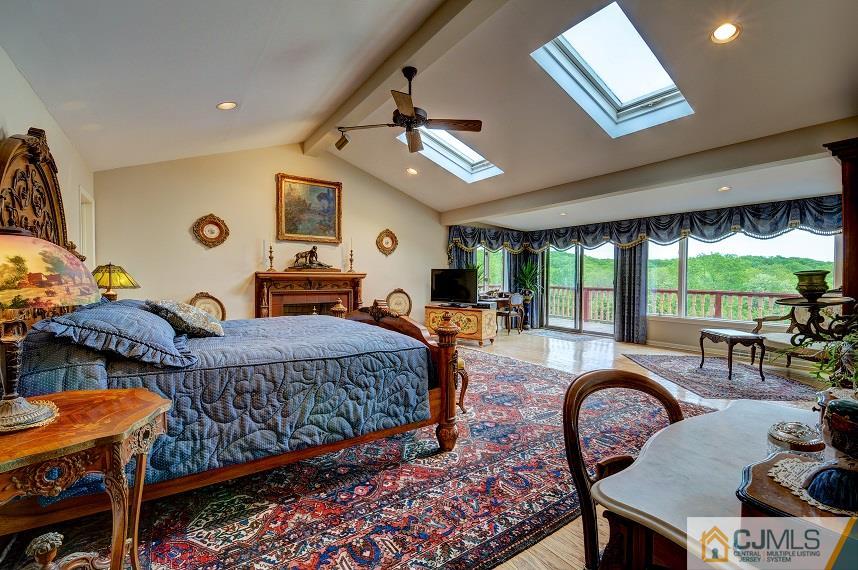 68 Harbourton Woodsville Road Pennington, NJ 08534 - Photo 17 of 25 a bedroom with furniture and a large window
