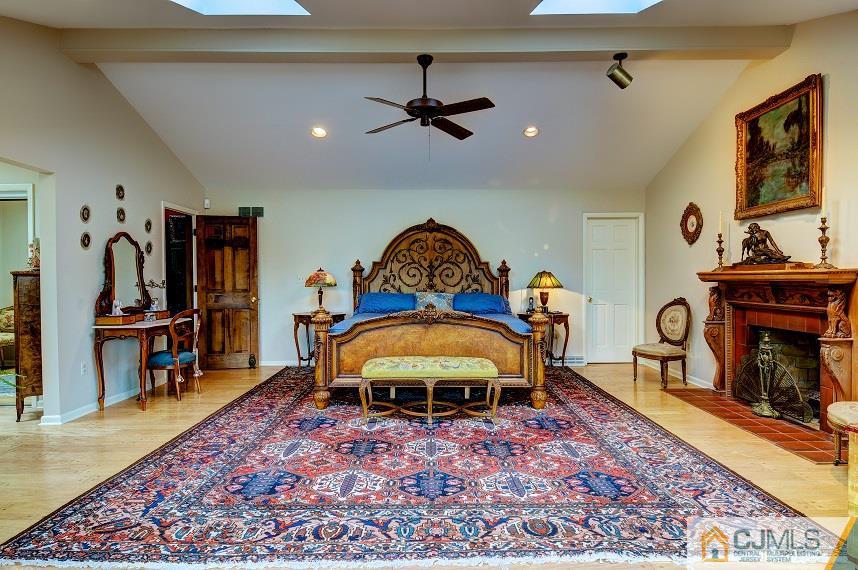 68 Harbourton Woodsville Road Pennington, NJ 08534 - Photo 18 of 25 a living room with furniture a rug and a fireplace