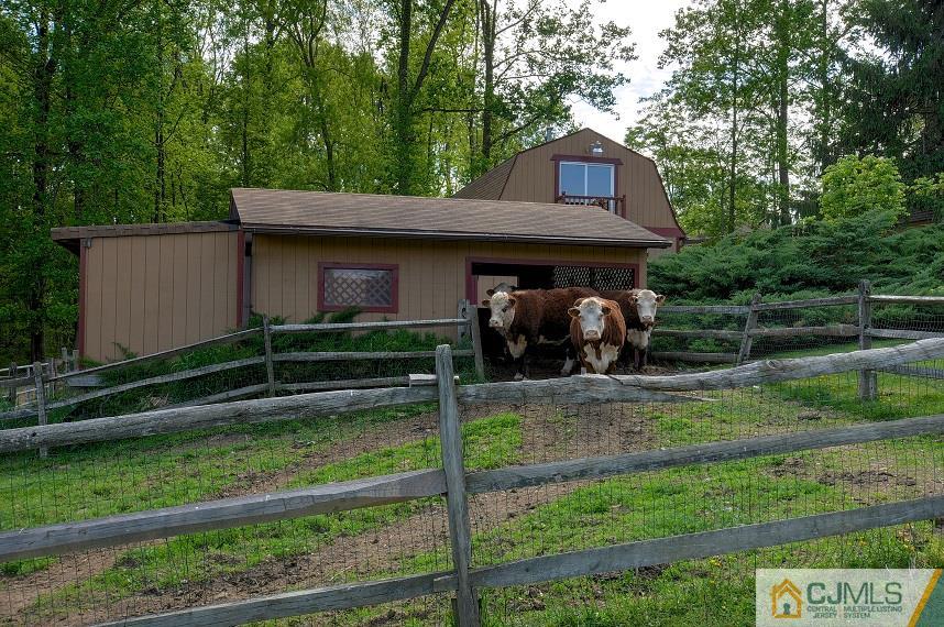 68 Harbourton Woodsville Road Pennington, NJ 08534 - Photo 25 of 25 a front view of a house with a yard