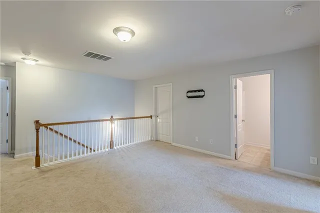 a bathroom with a tub a sink and mirror