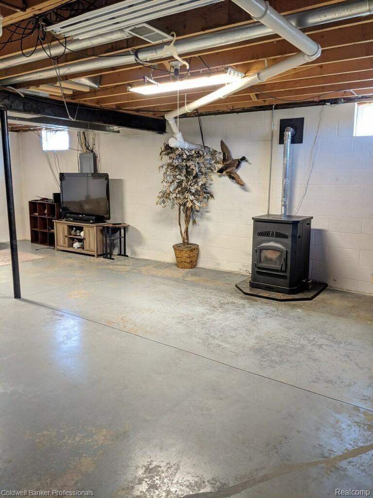 2591 Cove Road Goodells, MI 48027 - Photo 23 of 27 Basement and Stove.jpg