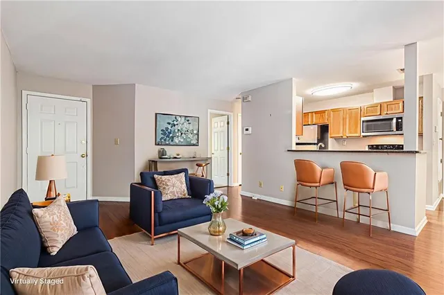 a living room with furniture and a table