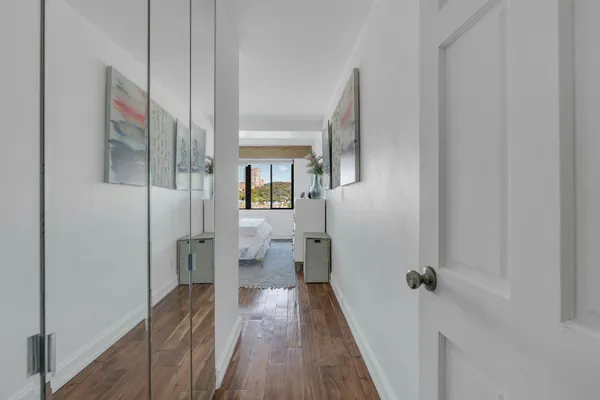 a view of a bathroom from a hallway