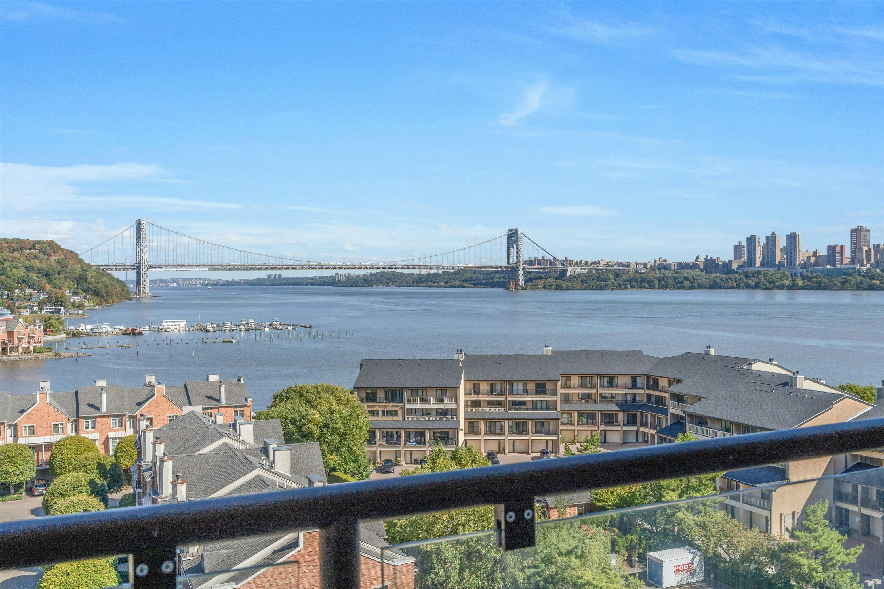 1203 River Road, Unit 9D Edgewater, NJ 07020 - Photo 21 of 28 a view of a lake from a balcony