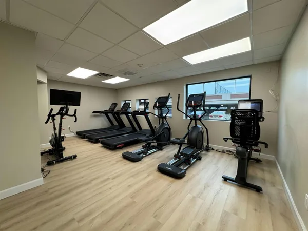 a view of a room with gym equipment