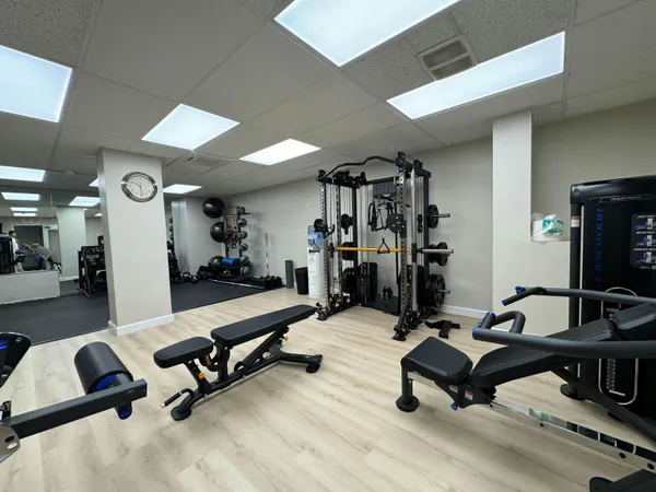 a view of a room with gym equipment