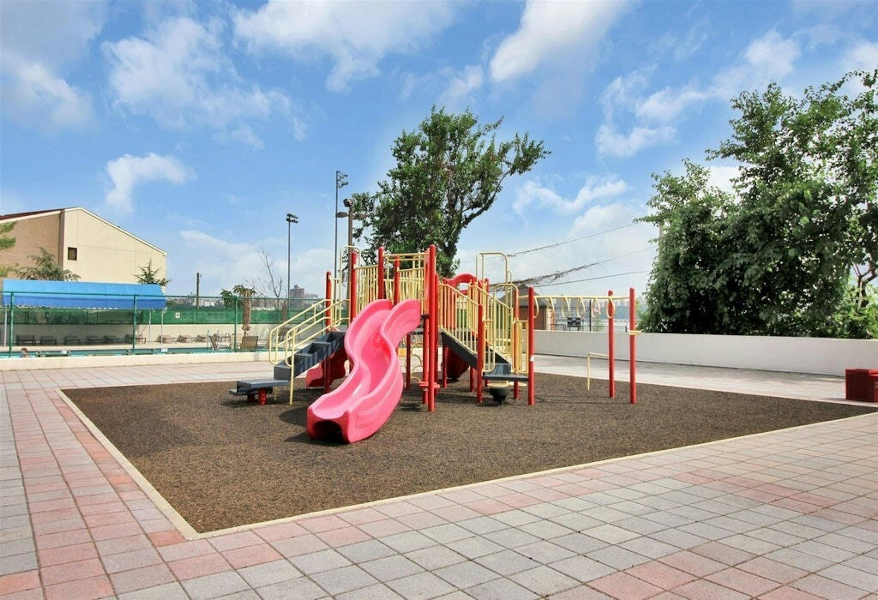 1203 River Road, Unit 9D Edgewater, NJ 07020 - Photo 25 of 28 a view of outdoor space with trampoline