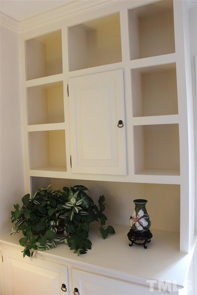 3120 Amherst Road Rocky Mount, NC 27804 - Photo 16 of 25 ....and custom cabinets & shelving to store all your treasures!