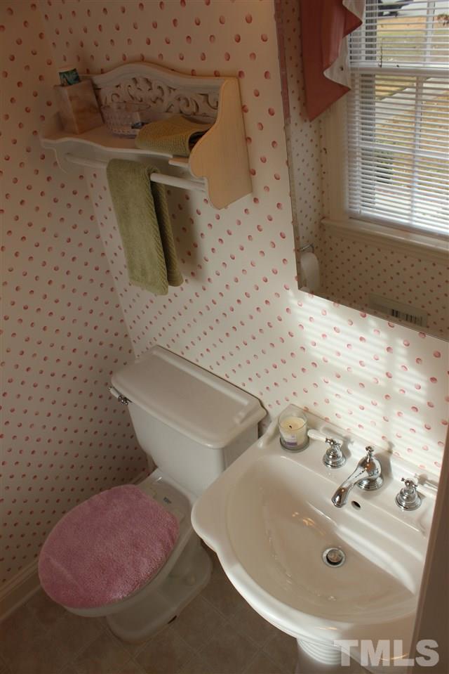3120 Amherst Road Rocky Mount, NC 27804 - Photo 24 of 25 ...with your own private half bath-- updated fixtures, toilet & pedastal sink.