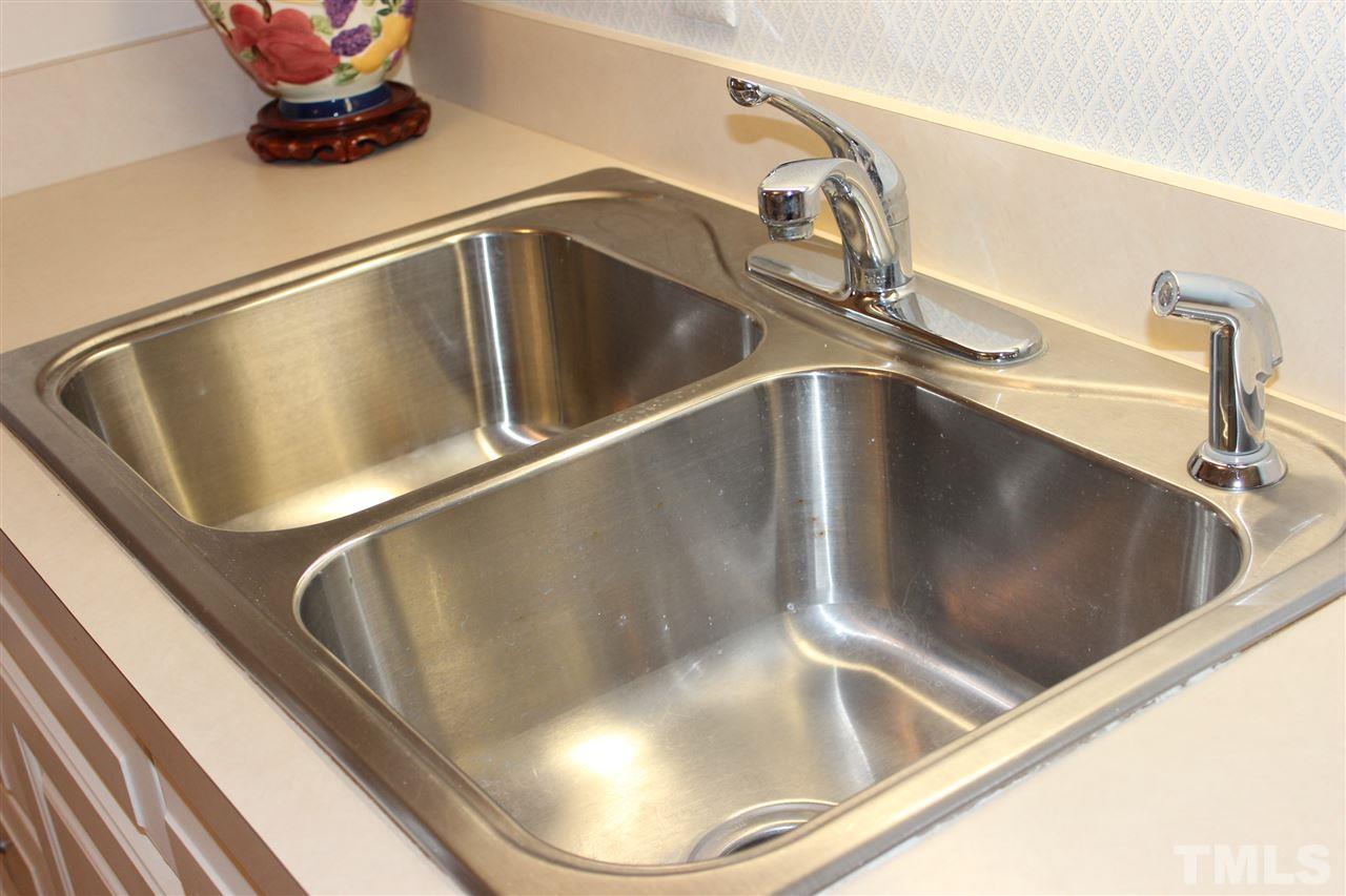 3120 Amherst Road Rocky Mount, NC 27804 - Photo 6 of 25 Sparkling double kitchen sink is just an example of how pristine this home is!