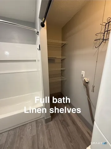 a view of livingroom with furniture and chandelier