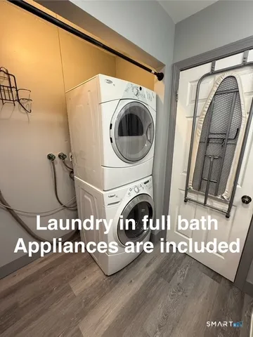 an empty room with wooden floor