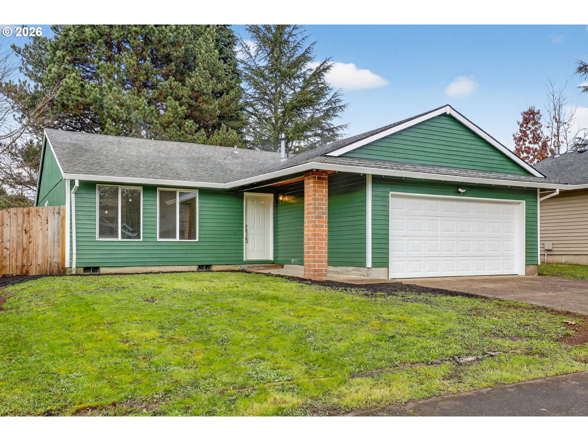 18830 Southwest Butternut Street Beaverton, OR 97078 - Photo 2 of 33 a view of a house with yard and tree